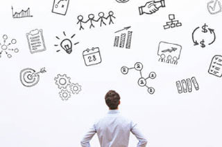 Back view of businessman looking up at various icons representing different challenges.